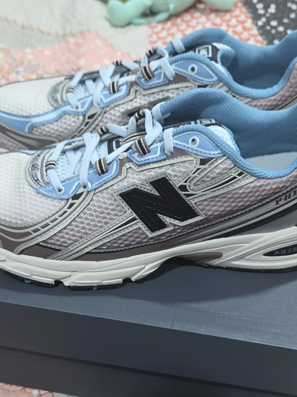 New Balance Unixes Light Blue, White and Gray Athletic Sneakers